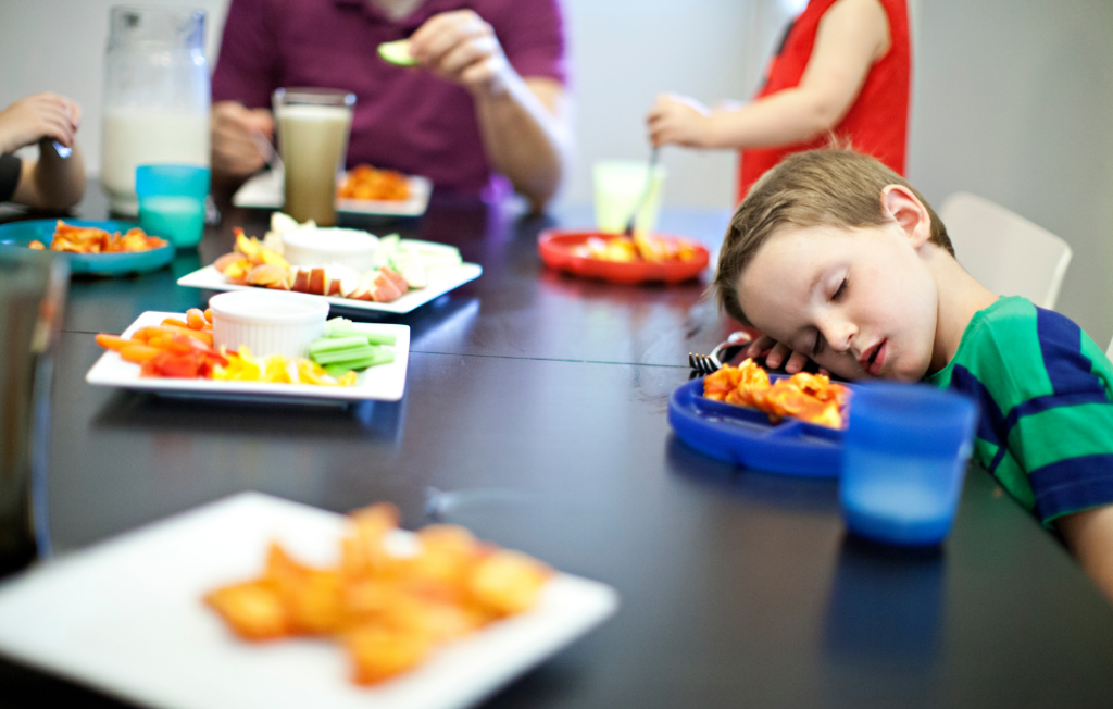 Burnout kid resting at the table