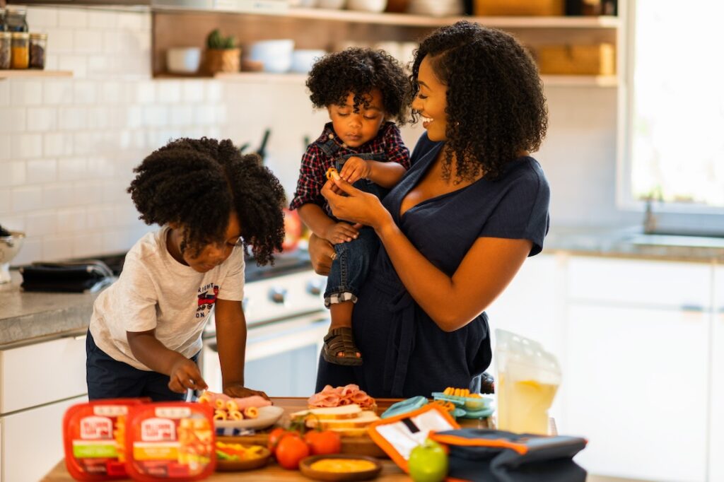 Mom and her kids packing lunch