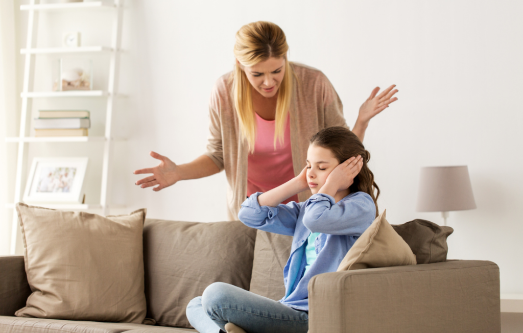 Mom angry and pushing her daughter